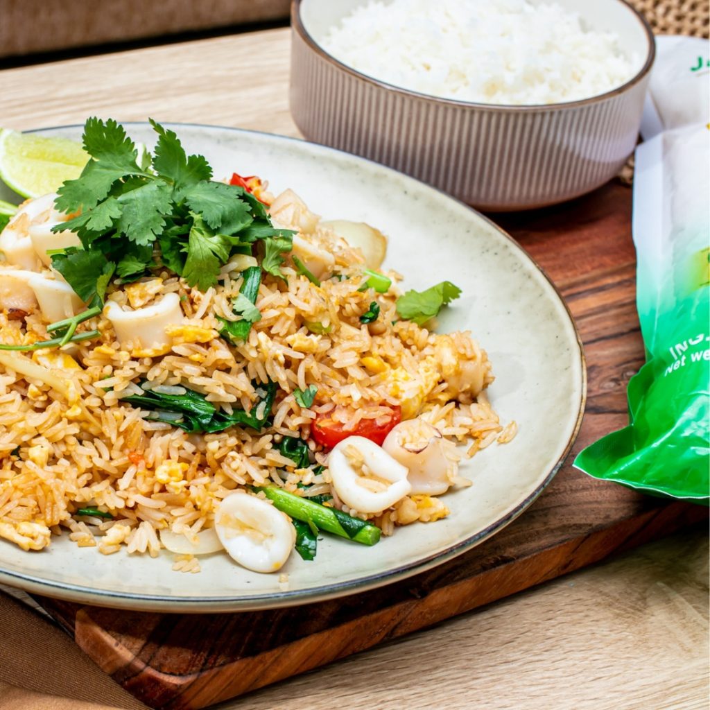 image presents Thai Fried Rice with Squid (ข้าวผัดปลาหมึก)