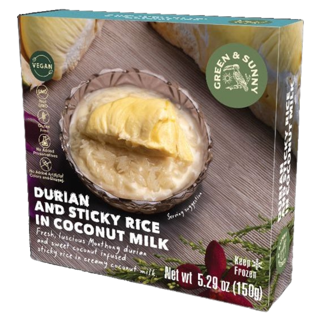 A box of Green&sunny Durian & Sticky Rice 12x150g with a bowl of durian and sticky rice in coconut milk on a table.