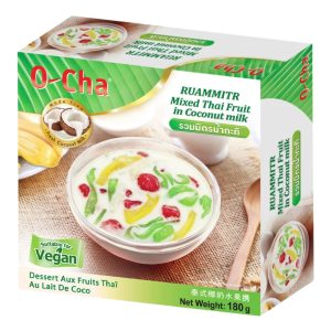 A box of O-Cha Mixed Thai Fruit in Coconut Milk with a net weight of 180 grams. The packaging features a bowl of mixed Thai fruit in coconut milk, which includes green, yellow, and red fruit pieces in a creamy white liquid. The box is labeled as Suitable for Vegan and highlights that it is made from fresh coconut milk.